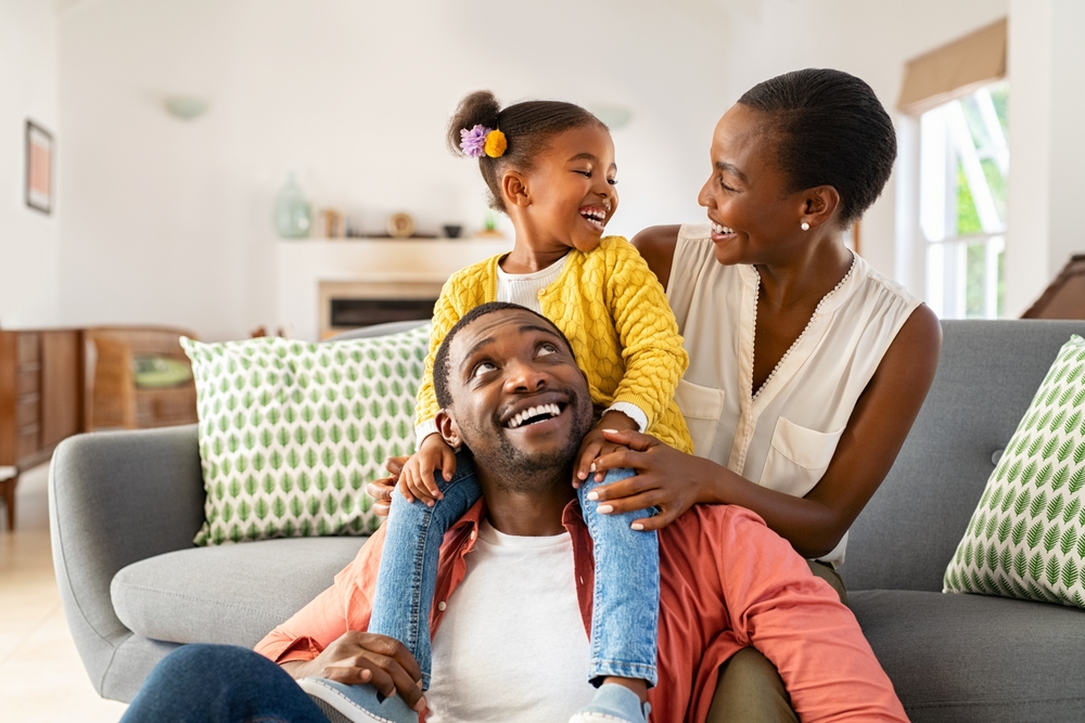 Picture of African American mother, father, and young girl